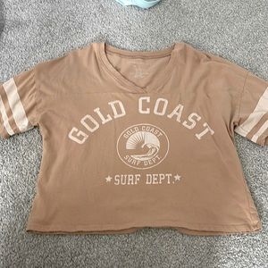 grayson threads shirt, tan in color, size large but fits as a medium